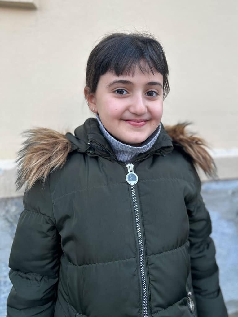 Porträtfoto von Melek, 9 Jahre